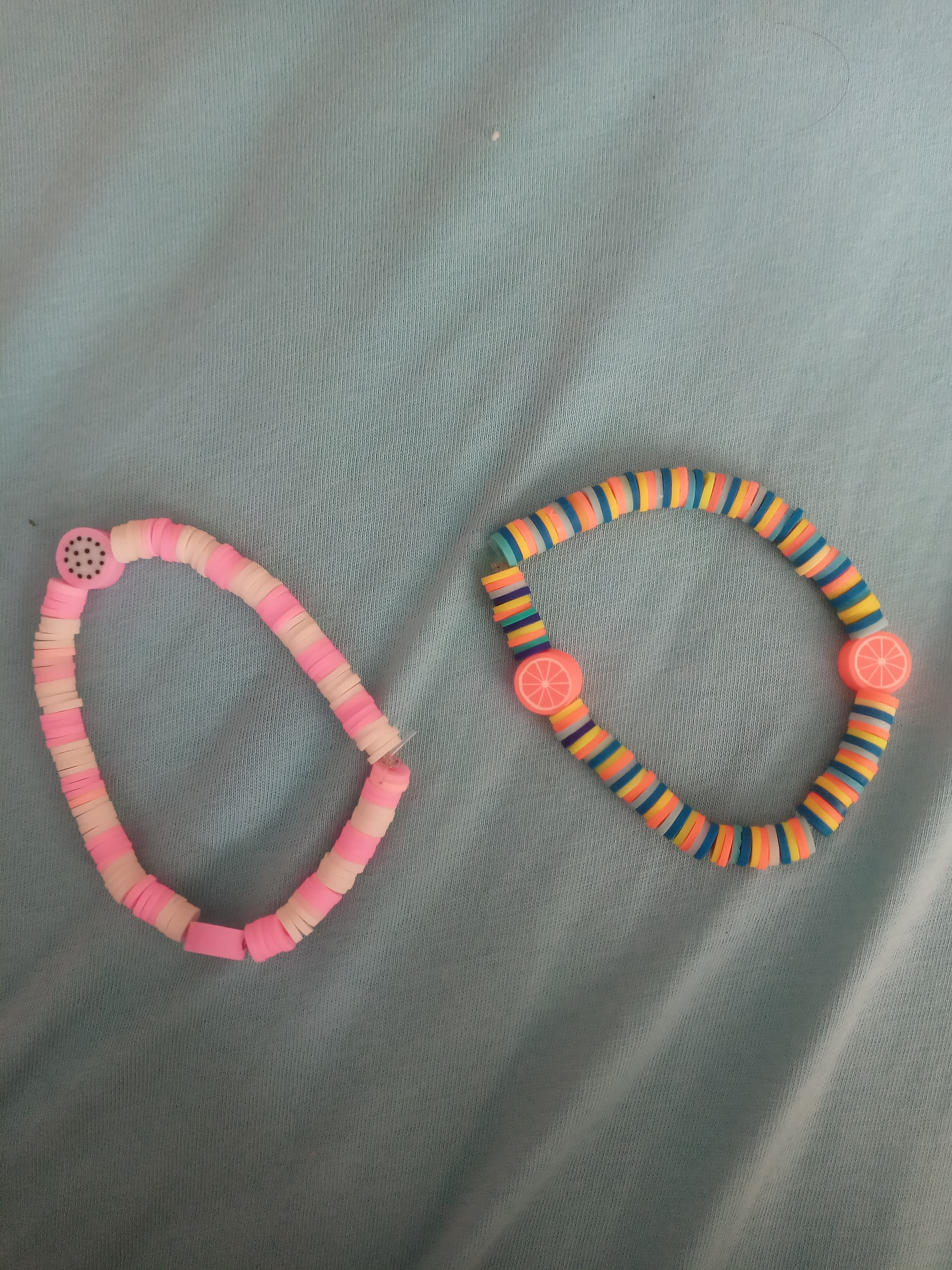 two clay-bead bracelets